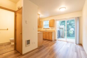 Kitchen with sliding door to backyard. 4616 NE Irving St #4614, Portland, OR 97213. Spaces for rent by NWV Group.