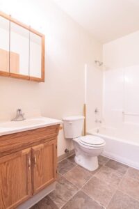 Full bathroom with tub and vanity. 4616 NE Irving St #4614, Portland, OR 97213. Spaces for rent by NWV Group.