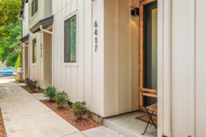 Hallway leading into a bright living space with natural light. 6417 N Greeley Ave #4, Portland, OR 97217. Spaces for rent by NWV Group.