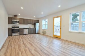 Spacious kitchen with stainless steel appliances. 9572 N Calhoun Ave UNIT B, Portland, OR 97203. Spaces for rent by NWV Group.