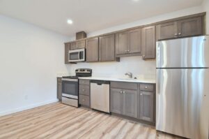 Spacious kitchen with stainless steel appliances. 9572 N Calhoun Ave UNIT B, Portland, OR 97203. Spaces for rent by NWV Group.