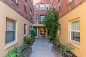 Courtyard entrance with benches and greenery. Spaces for rent by NWV Group. 1210 SE 20th Ave APT 103, Portland, OR 97214.