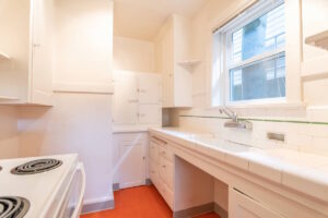 Kitchen counter space with sink and natural light. Spaces for rent by NWV Group. 1210 SE 20th Ave APT 103, Portland, OR 97214.