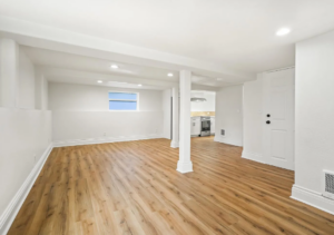 Large open living space with hardwood floors and white walls. Spaces for rent by NWV Group. 125 NE Shaver St #B, Portland, OR 97212.