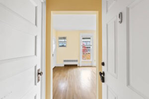 Bright entryway with white trim and yellow walls. 2233 NW Flanders St APT 9, Portland, OR 97210. Spaces for rent by NWV Group.